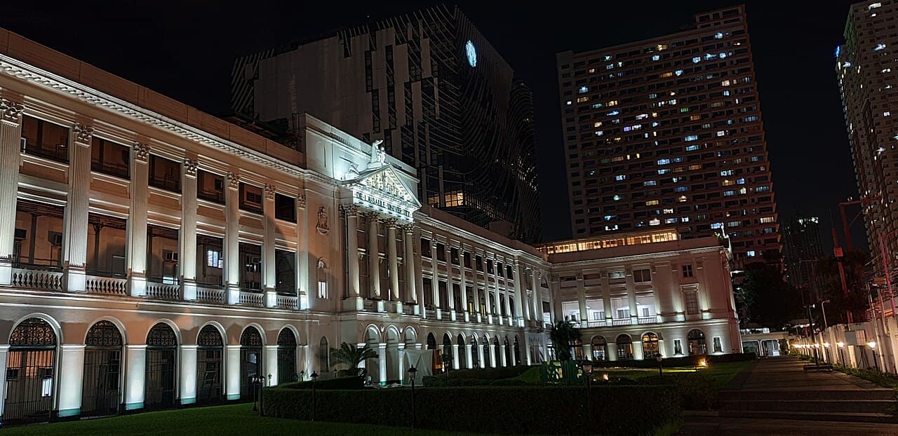 La Salle Hall at De La Salle University Manila, lit up at night